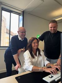 Zoe, Paul and Andrew from the Insites team working together and smiling